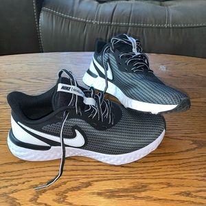Nike Revolution Running shoes. Size 7. Worn once